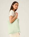 Light Tote Bag (Stem Green) - Front detail, model photo 1