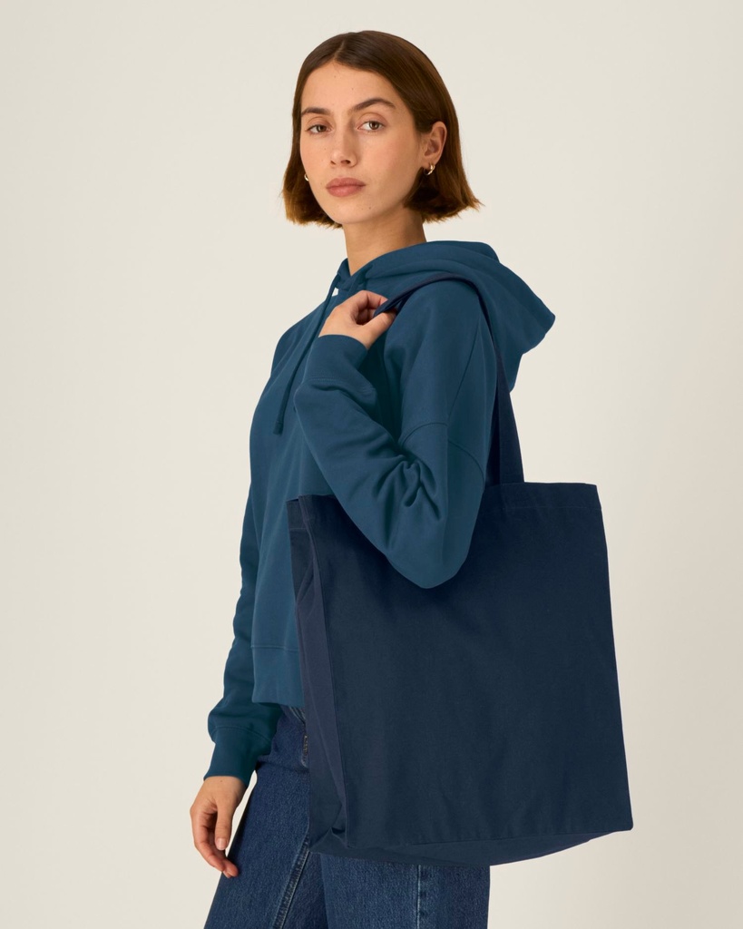 Mid Tote Bag (French Navy) - Front detail, model photo 1