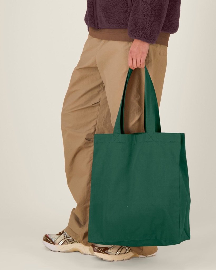 Mid Tote Bag (Bottle Green) - Front detail, model photo 1